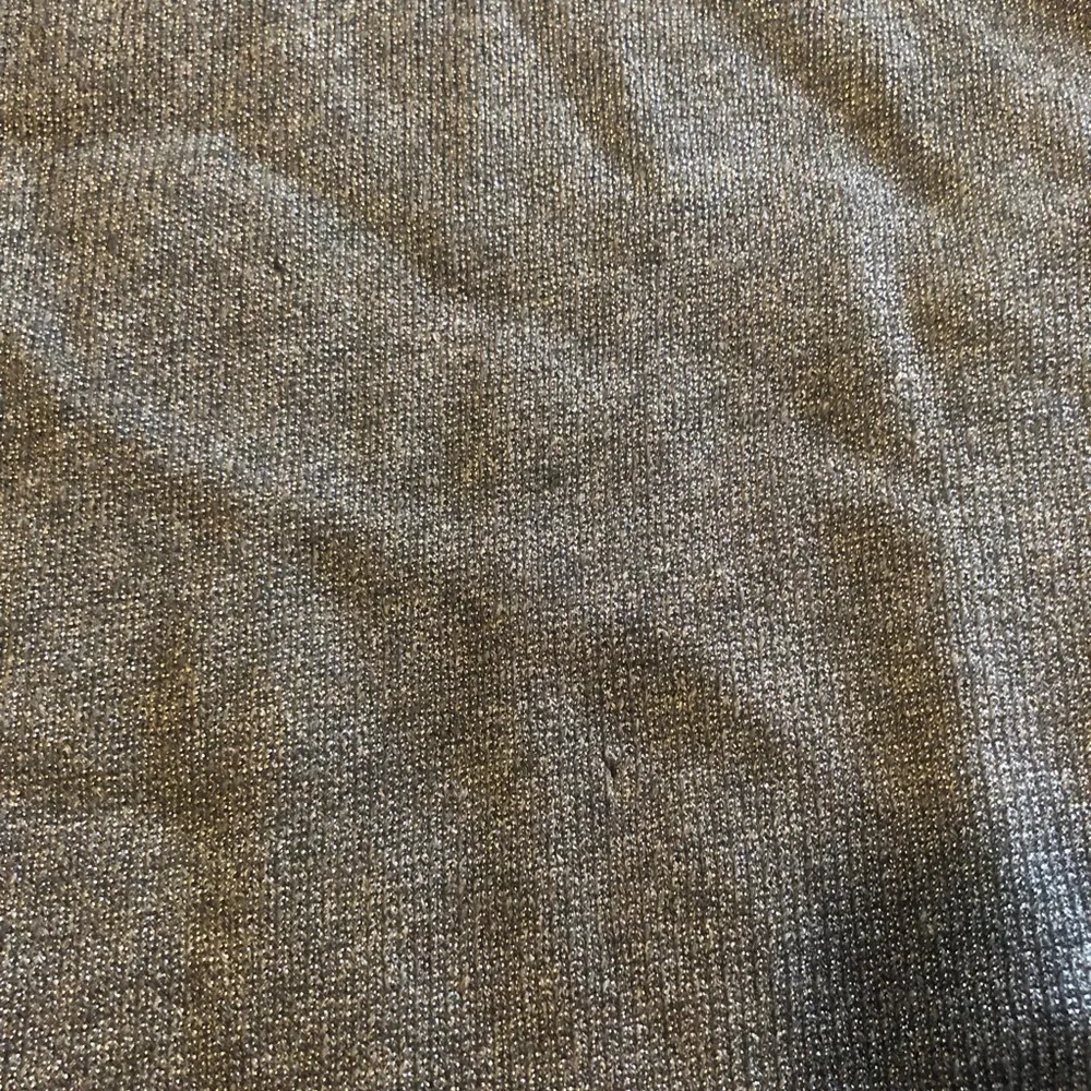 Pre-loved Chanel sparkly gray hoodie in size 44!